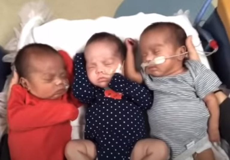 Dad hilariously loses battle against triplets when they raid the fridge