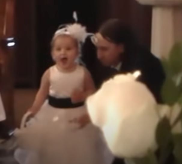 Tiny flower girl goes viral for her hilarious wedding entrance