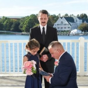 Stepdad uses family photo shoot to surprise stepdaughter with "adoption