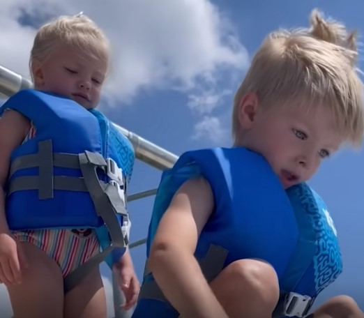 Little girl melts hearts with adorable ‘pep talk’ to jump into water